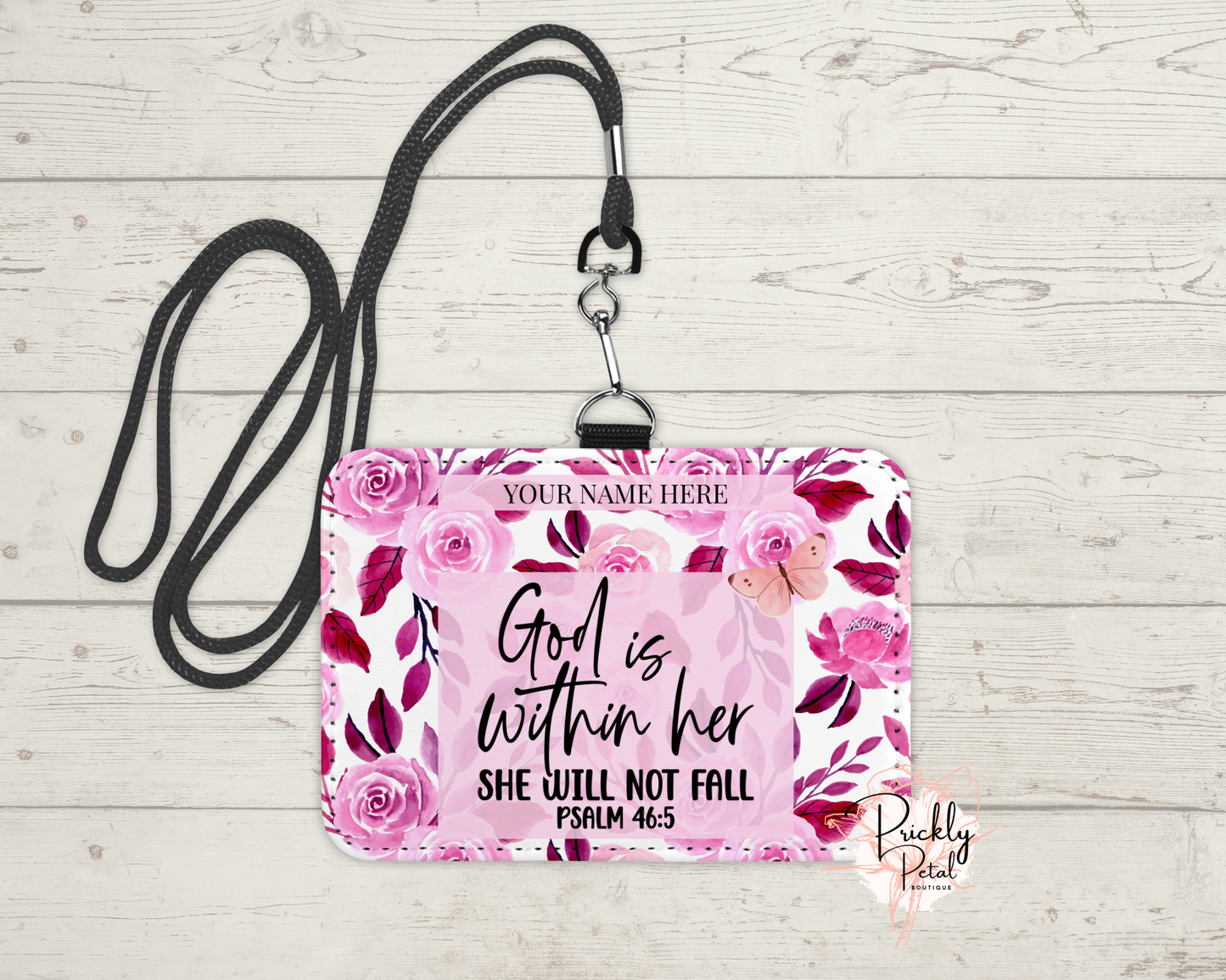 floral badge holder on wood background
