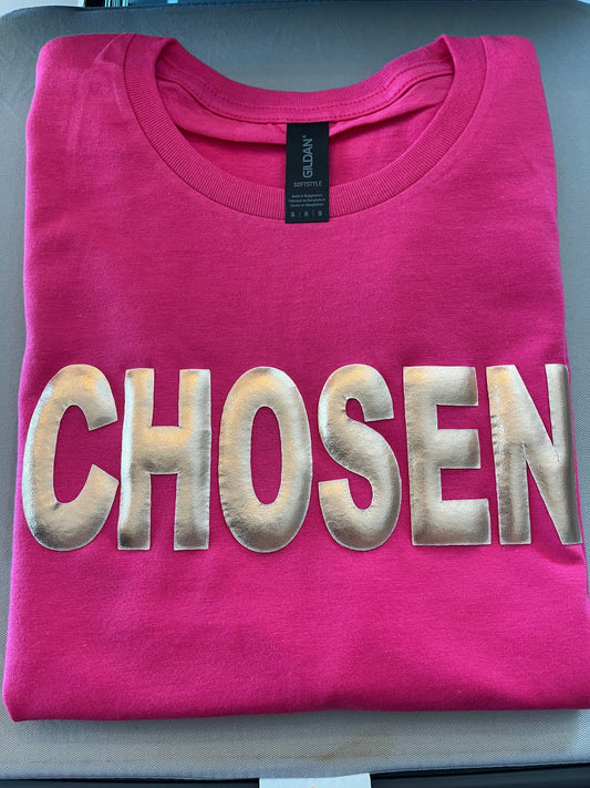 pink shirt on white background with chosen words on it