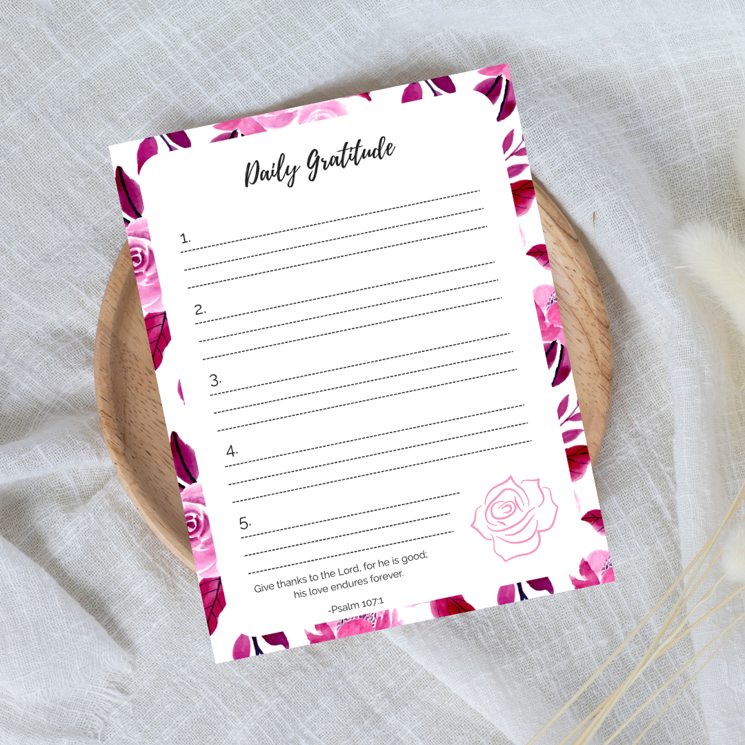 Daily Gratitude sheet with floral design on a textured surface