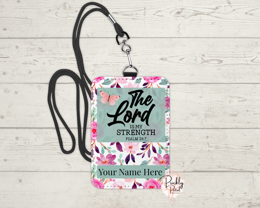 A daily reminder of strength and faith, beautifully carried with you. This floral badge holder features the encouraging words from Psalm 28:7: “The Lord is my strength.