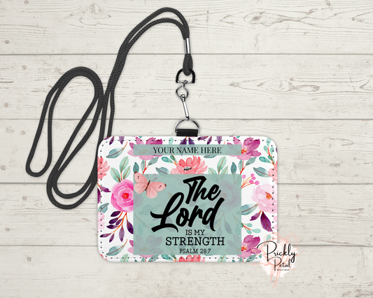 floral badge holder on wood background