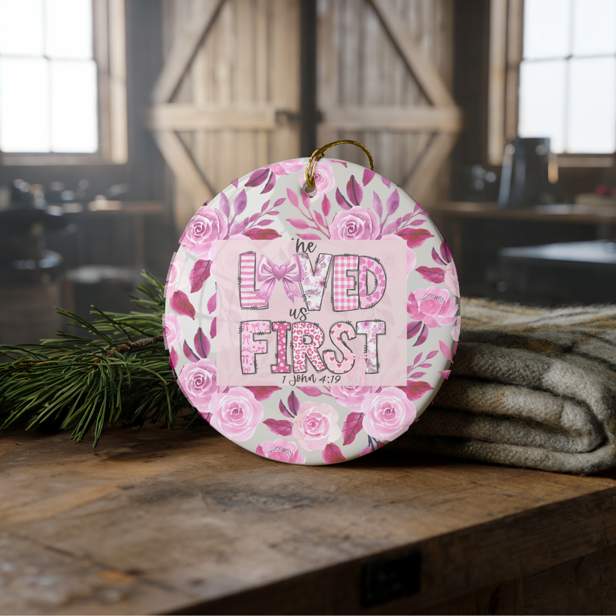 He Loved Us First — Ceramic Scripture Ornament