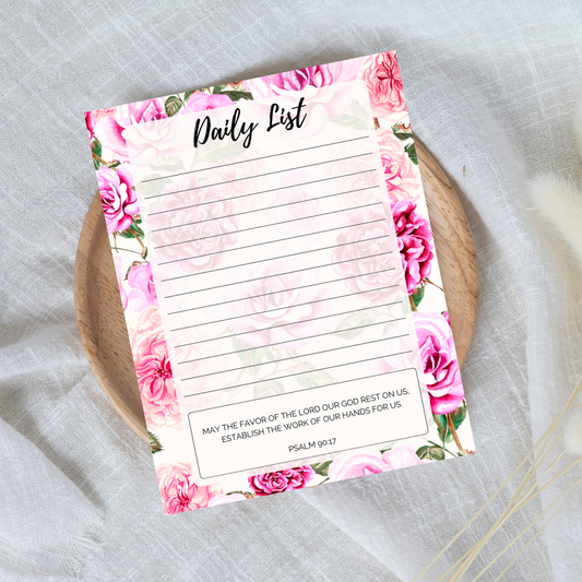 Floral daily list notepad on a textured surface