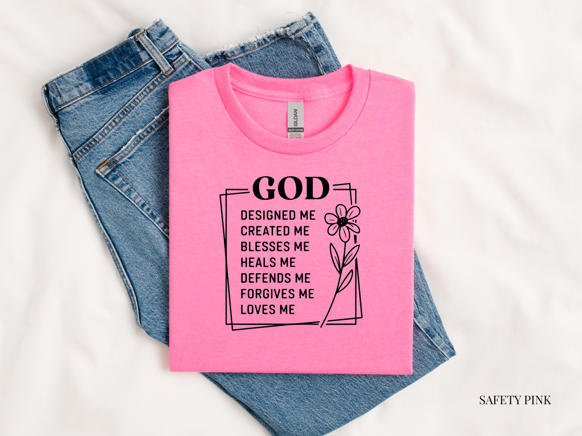 Pink t-shirt with motivational quote on jeans