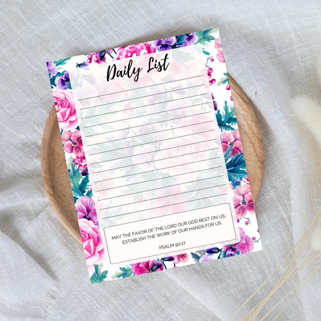 Floral daily list notepad on a textured surface