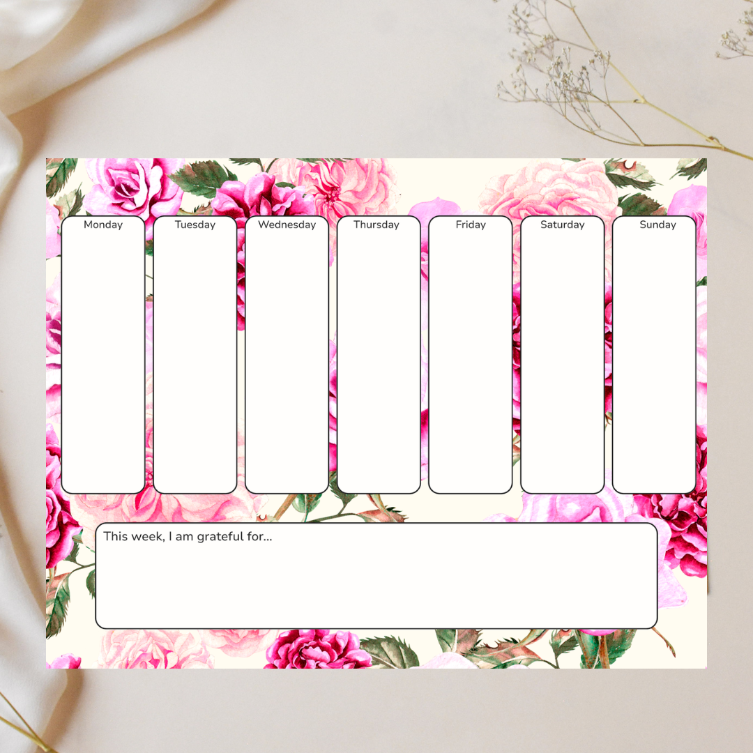 Weekly planner with floral design on a light background