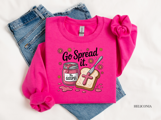 Pink sweatshirt with 'Go Spread It' design on a white background
