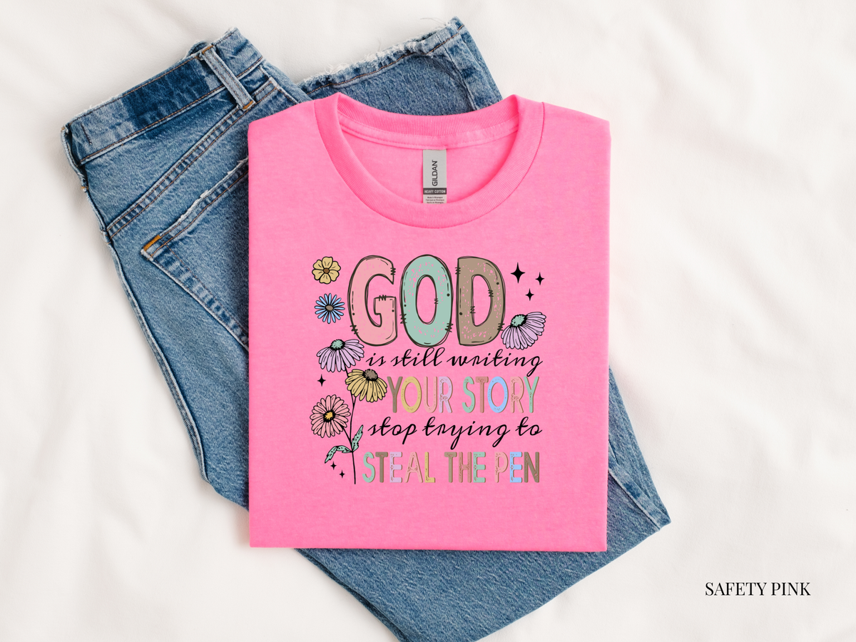 Pink t-shirt with motivational quote on jeans