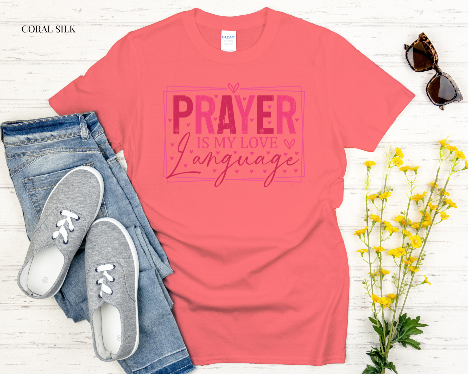 coral t shirt against white backgound