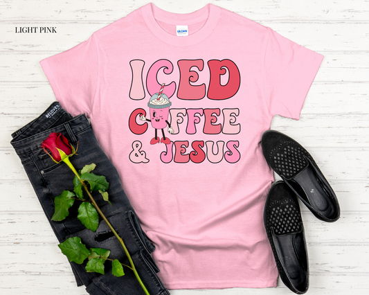 pink t shirt with design with black jeans and white background