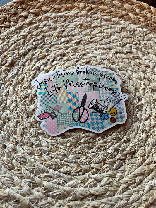 Decorative sticker with sewing-themed design on a woven surface