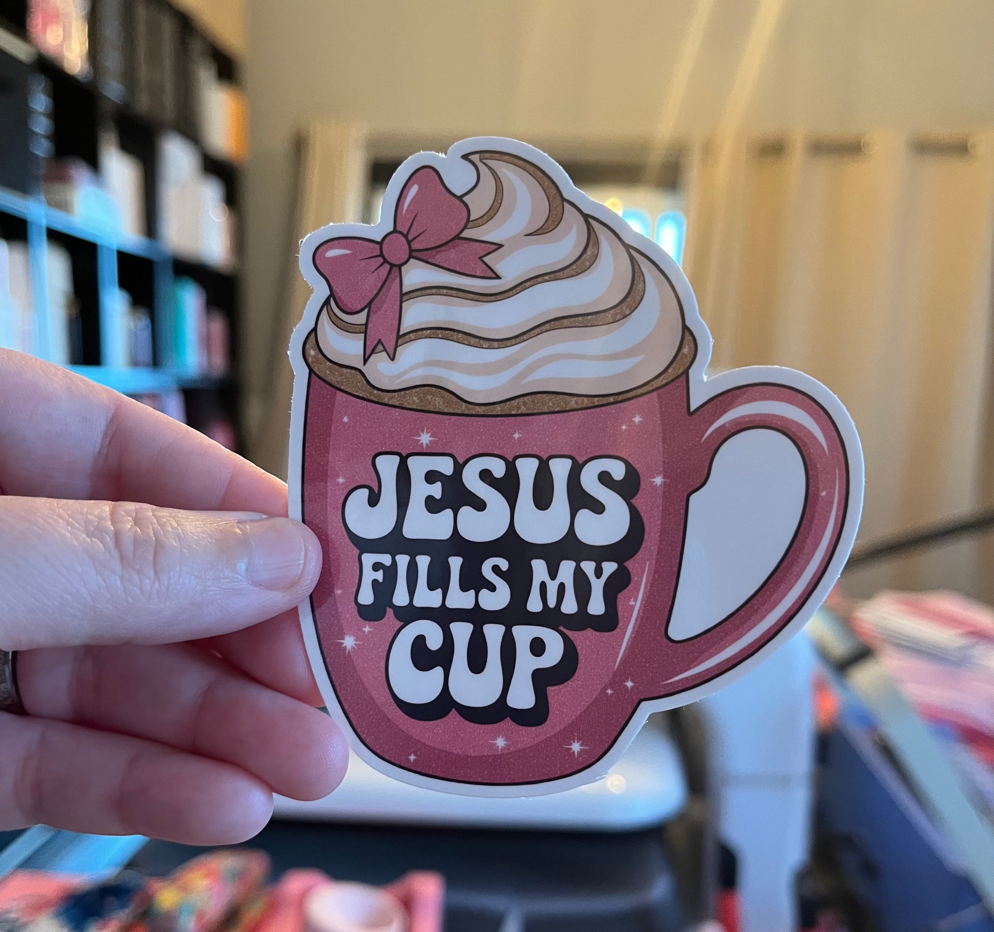 Jesus fills my cup vinyl sticker against blurred background