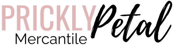Logo of Prickly Petal Boutique with a black and pink color scheme on a white background.